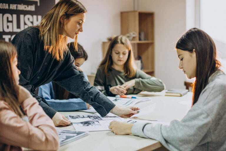 Group of students studying in school