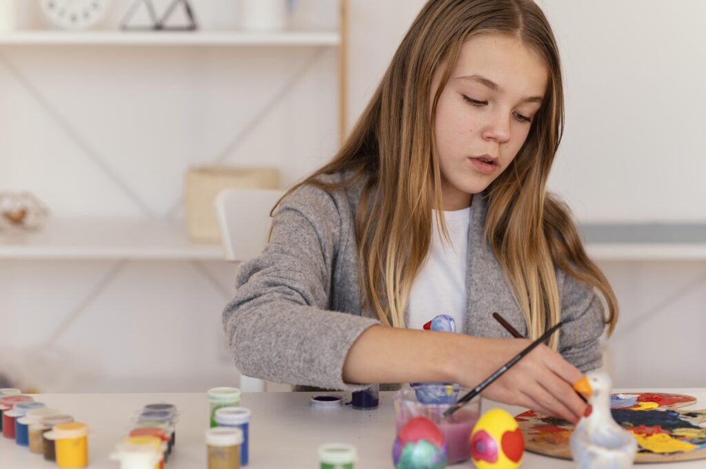 Teen girl painting